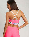 TOP CON ELASTICO LOGGATO FUXIA