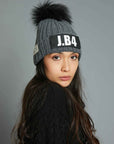 SPEAKING POMPON FUR GRAY BEANIE