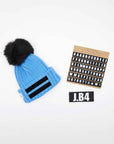 SPEAKING POMPON BLUE BEANIE