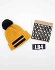 SPEAKING POMPON WOOL MUSTARD BEANIE