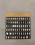 TABLET WITH LETTERS