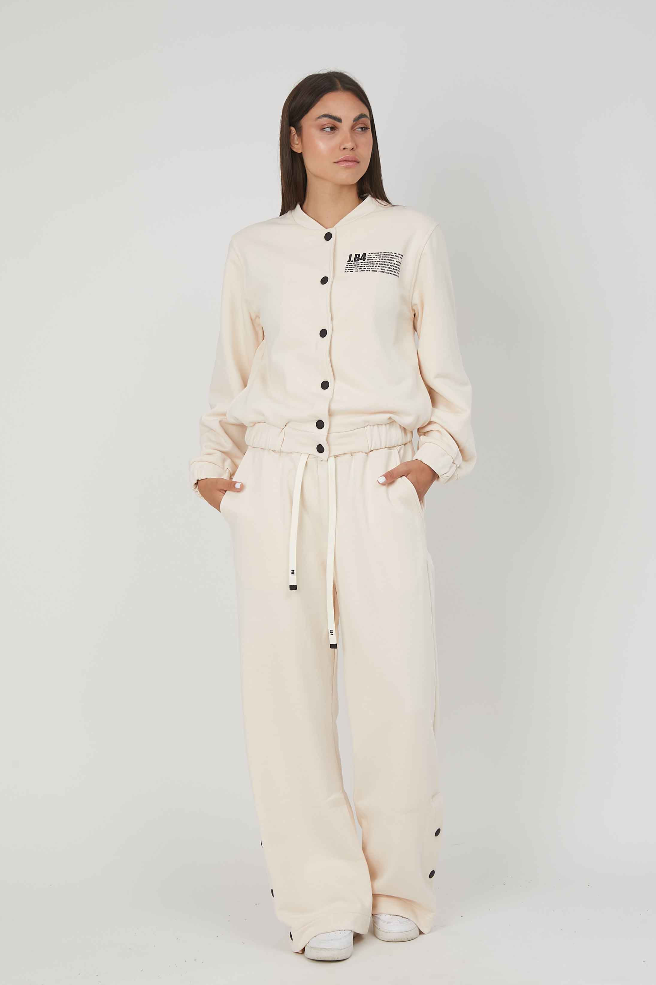 CREAM SIDED BUTTON SWEATH PANTS