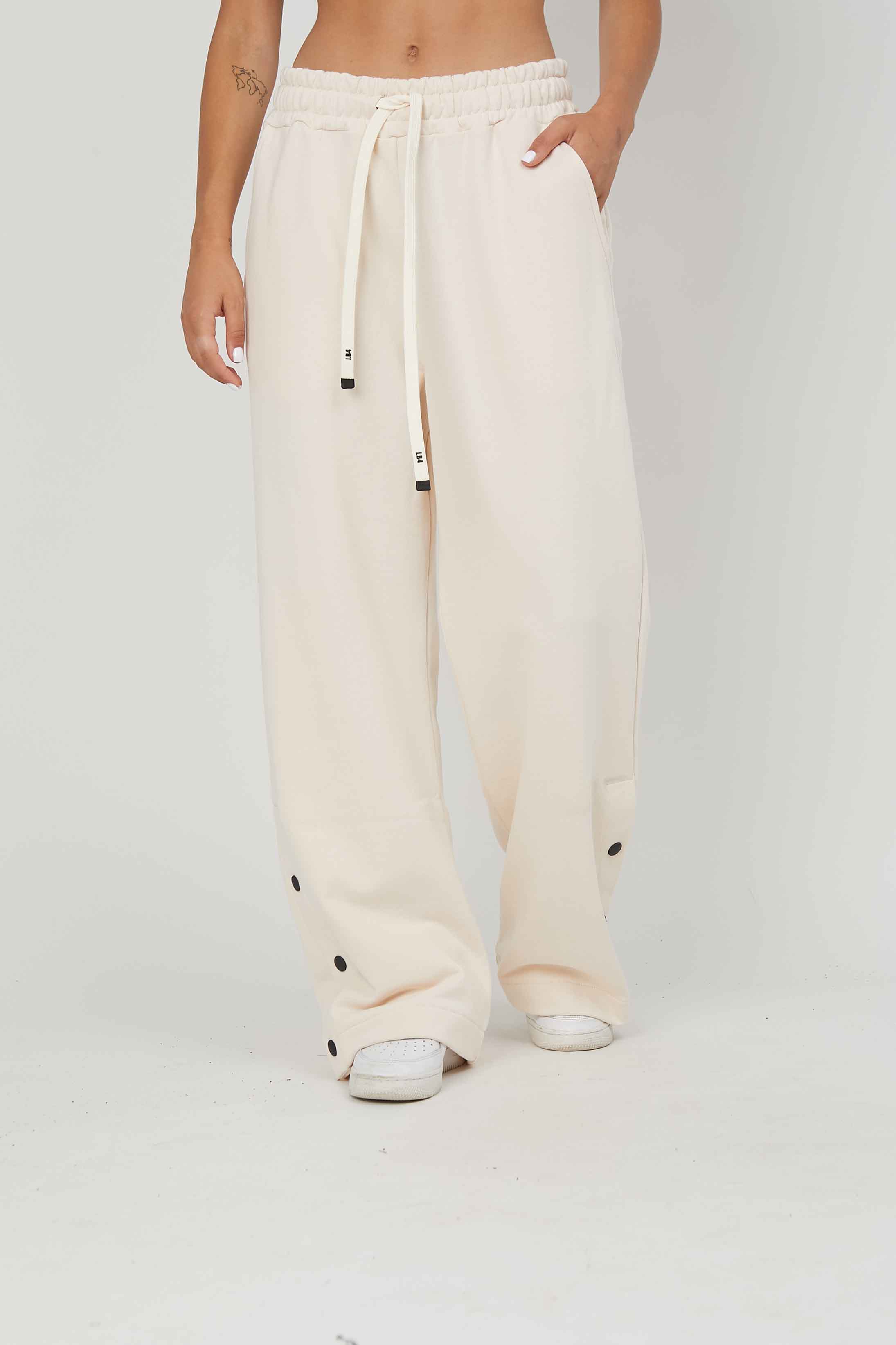 CREAM SIDED BUTTON SWEATH PANTS