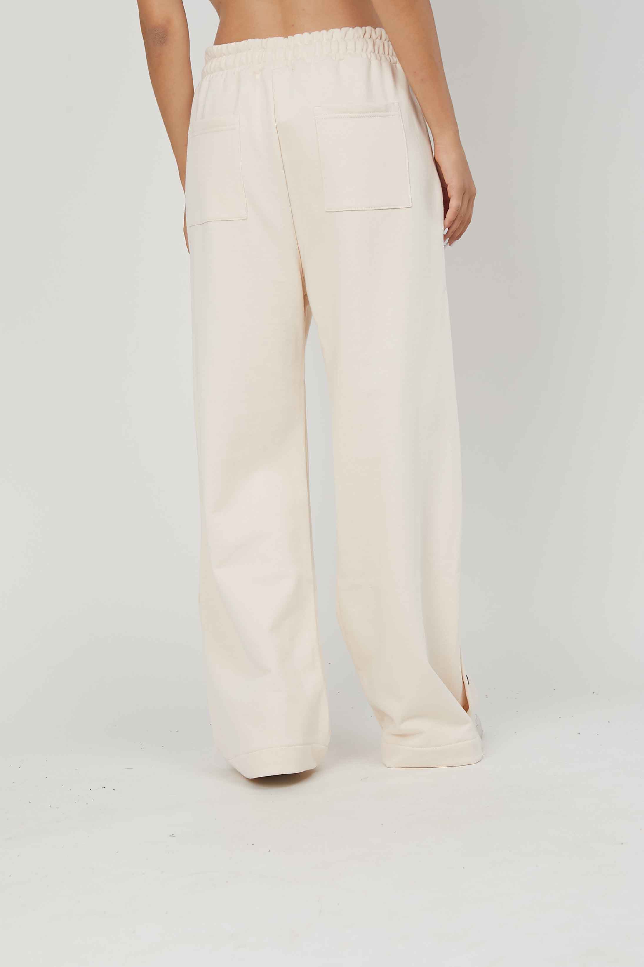 CREAM SIDED BUTTON SWEATH PANTS