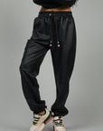 FAUX LEATHER TROUSERS WITH POCKETS BLACK