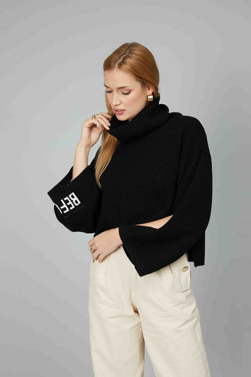 SWEATER WITH CUT OUT BLACK SLEEVES