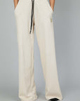 PITTBULL IVORY FLARED TROUSERS