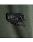 GREEN COTTON SWEATSHIRT WITH ANTI-THEFT LOGO